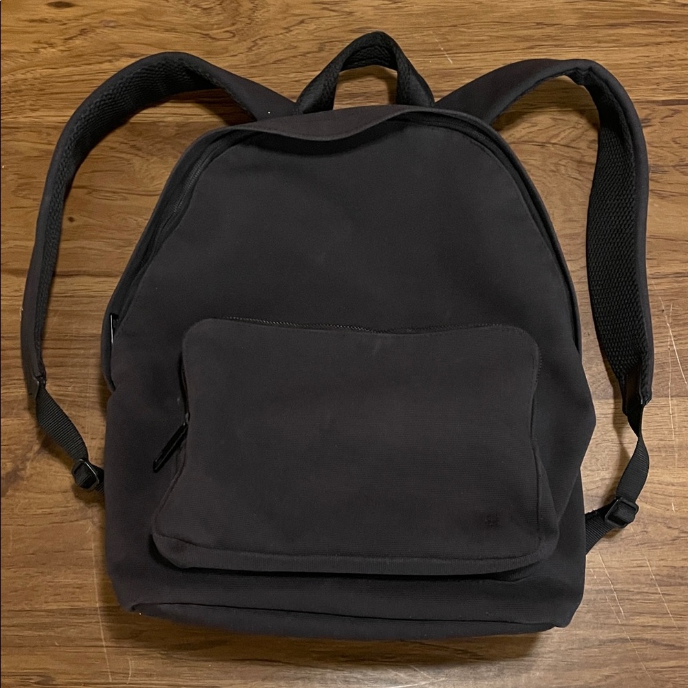 LuluLemon black canvas backpack, interior/exterior pockets, excellent condition
